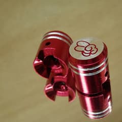 Olympique Bouchons de valve dés rouge Lot de 2